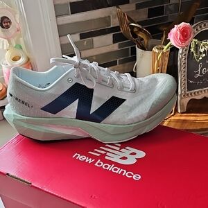 New Balance White and Blue Athletic Shoes
